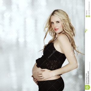 beautiful-eight-months-pregnant-blond-woman-19624534.jpg